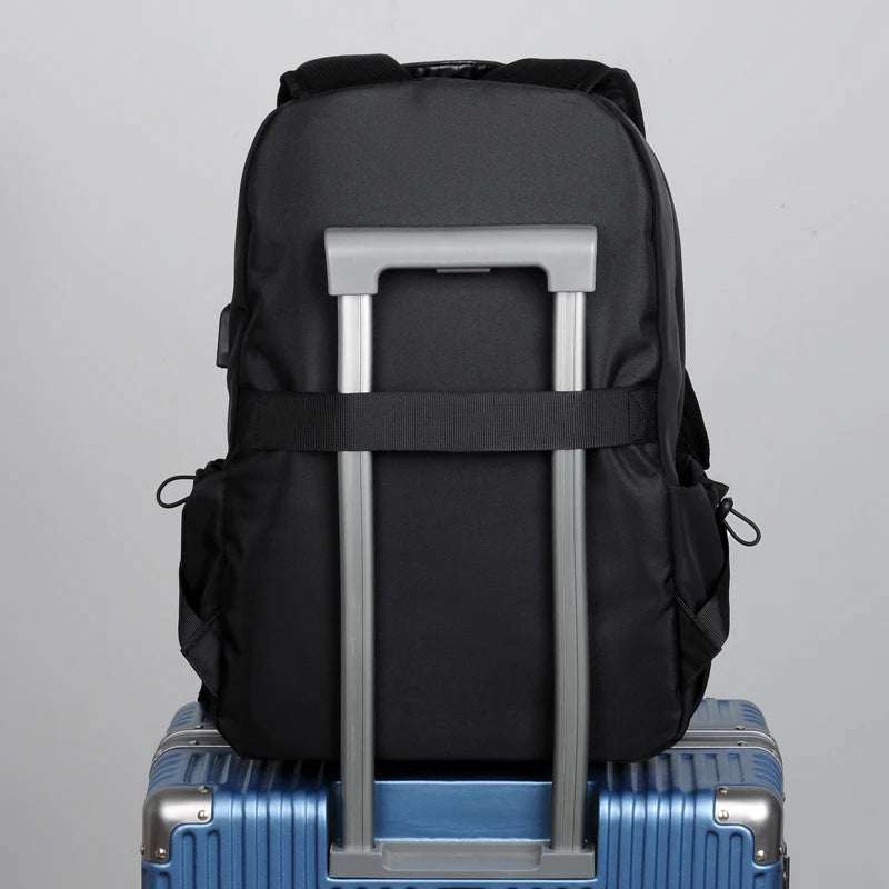 Simple solid color backpack with laptop compartment and USB charging port, suitable for travel, commuting, school, business