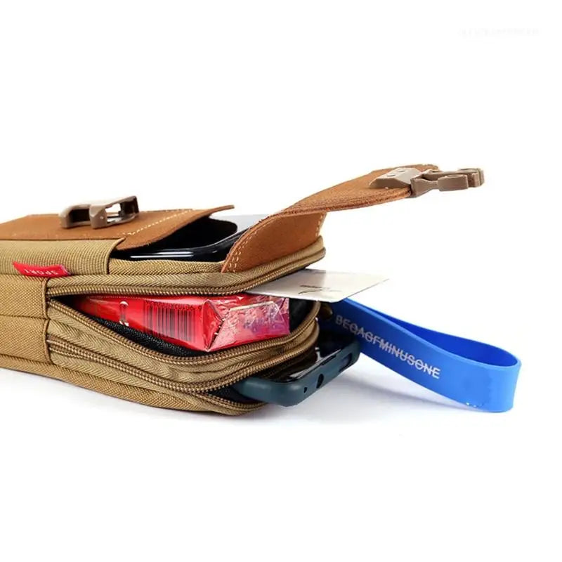 Vertical canvas waist bag in green color on neutral background